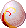 This%20radiant%20white%20egg%20has%20red%20and%20gold%20swirls%20on%20it.gif